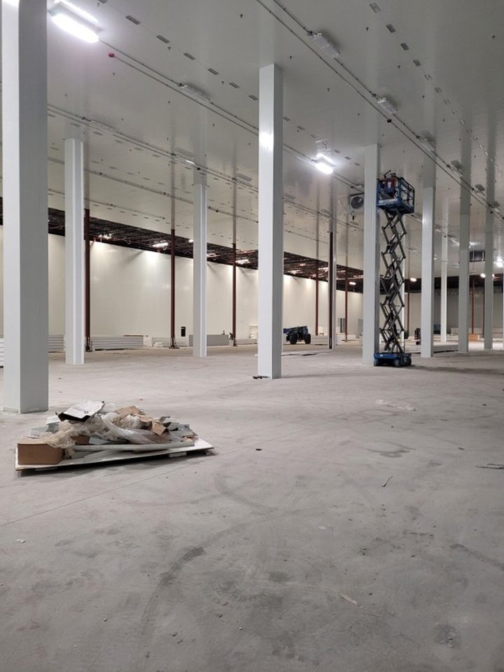 Installation of low temperature freezer LED lighting.