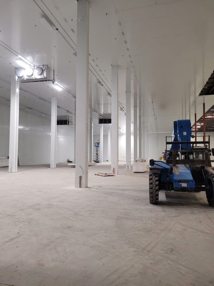 Additional freezer interior installation progress view.